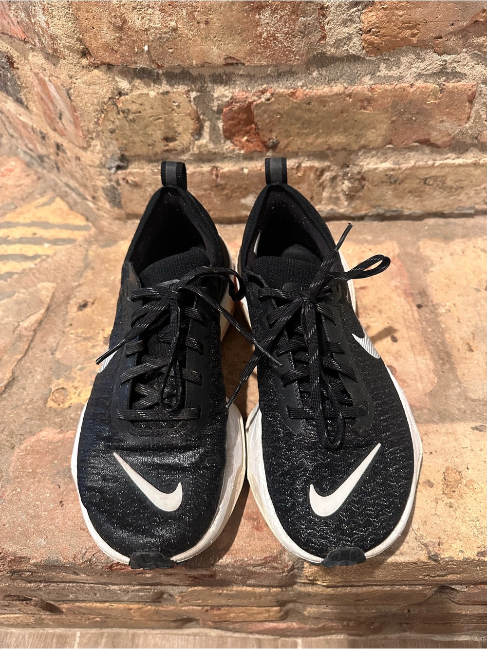 Nike Black Athletic Running Shoes with White Swoosh